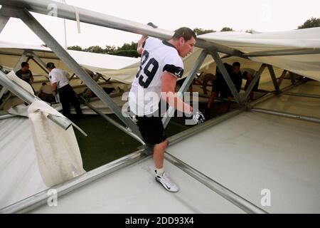 NO FILM, NO VIDEO, NO TV, NO DOCUMENTARY - Dallas Cowboys rookie tight end John Phillips (89) helps search for trapped team and staff after the Cowboys' indoor facility collapse in Irving, TX, USA on May 2, 2009. Photo by Ron Jenkins/Fort Worth Star-Telegram/MCT/Cameleon/ABACAPRESS.COM Stock Photo