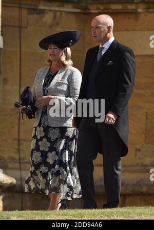 Sir Clive Woodward and Jayne Williams arrive at St George's Chapel at Windsor Castle for the wedding of Meghan Markle and Prince Harry. Windsor, UK, on Saturday May 19, 2018. Photo by Lionel Hahn/ABACAPRESS.COM Stock Photo