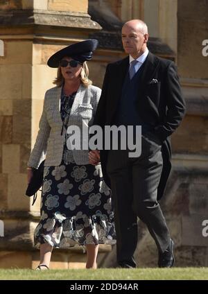 Sir Clive Woodward and Jayne Williams arrive at St George's Chapel at Windsor Castle for the wedding of Meghan Markle and Prince Harry. Windsor, UK, on Saturday May 19, 2018. Photo by Lionel Hahn/ABACAPRESS.COM Stock Photo