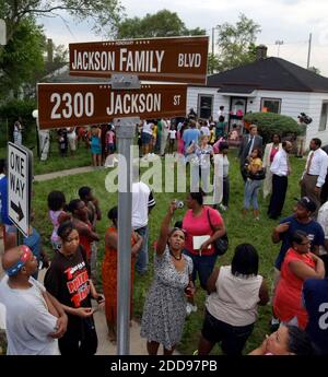 NO FILM, NO VIDEO, NO TV, NO DOCUMENTARY - Fans and friends gather outside Michael Jackson Hometown in Gary, Indiana, compound to leave flowers and gifts and pay their respects as the family arrives from UCLA Medical Center where Michael Jackson was pronounced dead after suffering from cardiac arrest this afternoon, in Encino. Gary, Indiana, USA on June 25, 2009. Photo by Terrence Antonio James/MCT/ABACAPRESS.COM Stock Photo