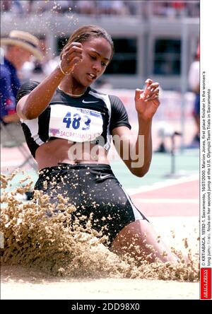 NO FILM, NO VIDEO, NO TV, NO DOCUMENTARY - © KRT/ABACA. 19782-1. Sacramento, 16/07/2000. Marion Jones, first place finisher in the women's long jump finals, fouls on her second jump at the U.S. Olympic Team Trials in Sacramento Stock Photo
