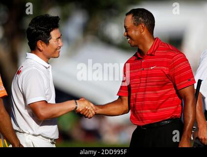 NO FILM, NO VIDEO, NO TV, NO DOCUMENTARY - Tiger Woods, right, congratulates Y. E. Yang on the 18th green, after Yang's three-stroke victory at the PGA Championship at Hazeltine National Golf Club in Chaska, MN, USa on August 16, 2009. Photo by Anthony Souffle/Minneapolis Star Tribune/MCT/Cameleon/ABACAPRESS.COM Stock Photo