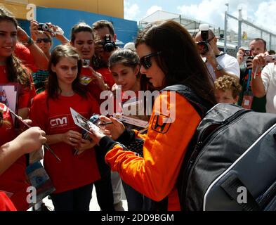 NO FILM, NO VIDEO, NO TV, NO DOCUMENTARY - Danica Patrick, right, signs autographs for a group of young girls prior to practicing for the Firestone Indy 300 at Homestead-Miami Speedway in Homestead, FL, USA on October 9, 2009. Photo by Carl Juste/Miami Herald/MCT/Cameleon/ABACAPRESS.COM Stock Photo