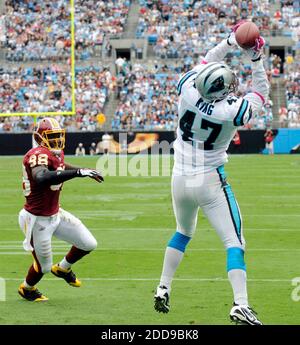 NO FILM, NO VIDEO, NO TV, NO DOCUMENTARY - Carolina Panthers' Jeff King (47) pulls in a touchdown past Washington Redskins' Brian Orakpo (98) in the third quarter at Bank of America Stadium in Charlotte, NC, USA on October 11, 2009. Photo by David T. Foster III/Charlotte Observer/MCT/ABACAPRESS.COM Stock Photo