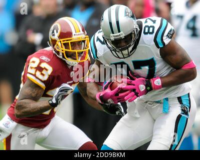 NO FILM, NO VIDEO, NO TV, NO DOCUMENTARY - Carolina Panthers' Muhsin Muhammad (87) hauls in a catch against Washington Redskins' DeAngelo Hall (23) in the first quarter of play at Bank of America Stadium in Charlotte, NC, USA on October 11, 2009. Photo by David T. Foster III/Charlotte Observer/MCT/ABACAPRESS.COM Stock Photo