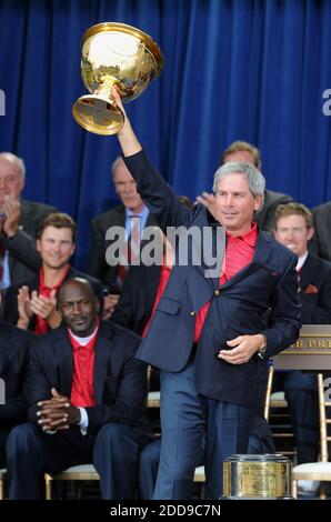 NO FILM, NO VIDEO, NO TV, NO DOCUMENTARY - United States team captain Fred Couples raises the U.S. Presidents Cup as the Americans celebrate their win at Harding Park Golf Course in San Francisco, CA, USA on October 11, 2009. Photo by Jose Carlos Fajardo/Contra Costa Times/MCT/ABACAPRESS.COM Stock Photo