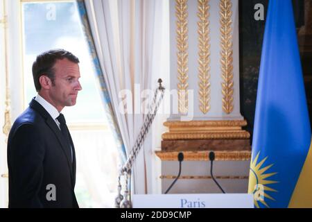 French President Emmanuel Macron arrives for a conference with Rwandan President after their meeting at the Elysee Palace in Paris, on May 23, 2018. Photo by Hamilton/Pool/ABACAPRESS.COM Stock Photo