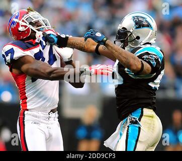 Carolina Panthers wide receiver Steve Smith 89 gets set to stiff arm New York Giants cornerback Terrell Thomas 24 during first half NFL action between the New York Giants and the Carolina Panthers