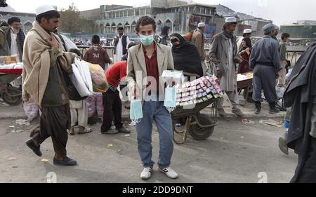 NO FILM, NO VIDEO, NO TV, NO DOCUMENTARY - A man sells surgical face masks to ward off the H1N1 flu in the central city marketplace in Kabul, Afghanistan on Saturday, November 7, 2009. The government has declared a state of emergency, and closed schools, universities and even wedding halls and public bathrooms for three weeks to slow the spread of the virus, which has killed 10 people in the capital in less than two weeks. Photo by Chuck Liddy/Raleigh News & Observer/MCT/ABACAPRESS.COM Stock Photo