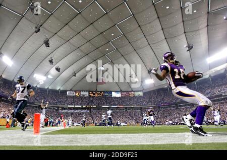 FILE- In this file photo taken Aug. 25, 2010, in Seattle, Minnesota Vikings  running back Chester Taylor runs pushing off Seattle Seahawks' Chuck Darby.  Taylor, who is now with the Chicago Bears