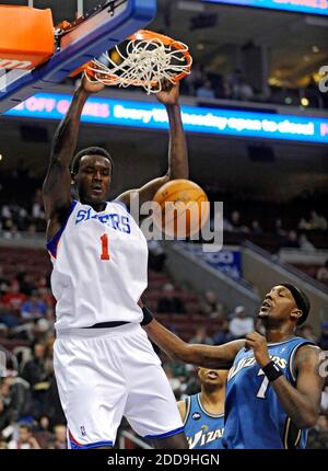 NO FILM, NO VIDEO, NO TV, NO DOCUMENTARY - The Philadelphia 76ers' Samuel Dalembert (1) slams down two of his 20 points over the Washington Wizards' Andray Blatche during second-half action in an NBA game at the Wachovia Center in Philadelphia, PA, USA on January 5, 2010. Washington rallied from an 18-point deficit for a 104-97 win. Photo by Clem Murray/Philadelphia Inquirer/MCT/Cameleon/ABACAPRESS.COM Stock Photo