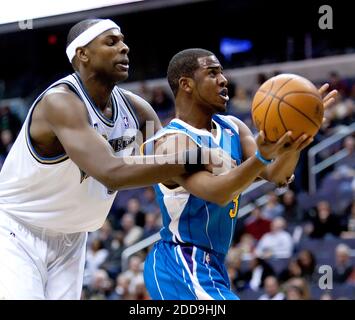 NO FILM, NO VIDEO, NO TV, NO DOCUMENTARY - Washington Wizards Brendan Haywood (33) wraps up New Orleans Hornets Chris Paul (3) during their game played at the Verizon Center in Washington, DC, USA on January 10, 2010. New Orleans defeated Washington 115-110. Photo by Harry E. Walker/MCT/ABACAPRESS.COM Stock Photo