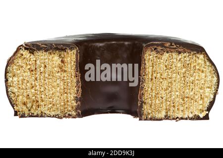 chocolate coated German Baumkuchen isolated on white background Stock Photo