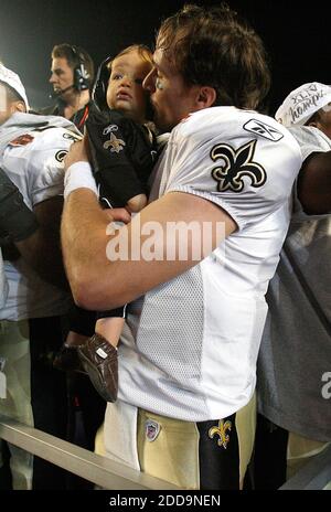 New Orleans Saints Drew Brees stretches on the sidelines before the game  against the New York Giants in week 4 of the NFL season at MetLife Stadium  in East Rutherford, New Jersey