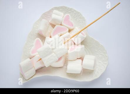 Pink heart shaped marshmallows isolated on white back ground Stock Photo -  Alamy