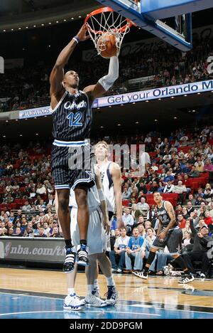 The Dallas Mavericks' Dirk Nowitzki dunks against the Detroit Pistons ...