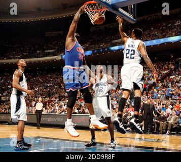 NO FILM, NO VIDEO, NO TV, NO DOCUMENTARY - Cleveland Cavaliers center Shaquille O'Neal (33) dunks over Orlando Magic center Dwight Howard (12) and forward Matt Barnes (22) during game action at Amway Arena in Orlando, Florida, Sunday, February 21, 2010. The Magic defeated the Cavaliers, 101-95. Photo by Gary W. Green/Orlando Sentinel/MCT/Cameleon/ABACAPRESS.COM Stock Photo