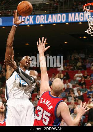 NO FILM, NO VIDEO, NO TV, NO DOCUMENTARY - Orlando Magic center Dwight Howard shoots over Los Angeles Clippers center Chris Kaman (35) during an NBA game at Amway Arena in Orlando, FL, USA on March 9, 2010. Photo by Stephen M. Dowell/Orlando Sentinel/MCT/Cameleon/ABACAPRESS.COM Stock Photo
