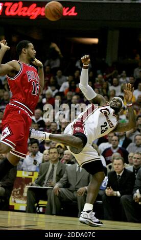 NO FILM, NO VIDEO, NO TV, NO DOCUMENTARY - Cleveland Cavaliers forward LeBron James, right, throws up an off-balance shot while being fouled by Chicago Bulls defender James Johnson during the NBA Eastern Conference Playoffs match, Game 2, Cleveland Cavaliers vs Chicago Bulls at Quicken Loans Arena in Cleveland, USA on April 19, 2010. Cleveland Cavaliers won 112-102. Photo by Ed Suba Jr./MCT/ABACAPRESS.COM Stock Photo