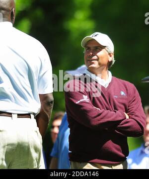 NO FILM, NO VIDEO, NO TV, NO DOCUMENTARY - Fred Couples, center, talks with Charlotte Bobcats majority team owner Michael Jordan at the 11th tee box during the pro-am for the Quail Hollow Championship at the Quail Hollow Club in Charlotte, NC, USA on April 28, 2010. Photo by Jeff Siner/Charlotte Observer/MCT/Cameleon/ABACAPRESS.COM Stock Photo