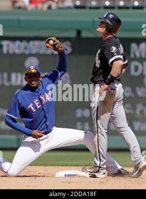 NO FILM, NO VIDEO, NO TV, NO DOCUMENTARY - Texas Rangers second baseman Joaquin Arias, left, has Chicago White Sox's Gordon Beckham (15) out at second base in the ninth inning at Rangers Ballpark in Arlington, TX, USA on April 29, 2010. The White Sox defeated the Rangers, 7-5. Photo by Paul Moseley/Fort Worth Star-Telegram/MCT/Cameleon/ABACAPRESS.COM Stock Photo