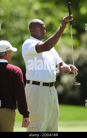 NO FILM, NO VIDEO, NO TV, NO DOCUMENTARY - Charlotte Bobcats majority owner Michael Jordan lines up a putt on the eighth green during the Pro Am at the Quail Hollow Club in Charlotte, NC, USA on April 29, 2010. Photo by Jeff Siner/Charlotte Observer/MCT/Cameleon/ABACAPRESS.COM Stock Photo