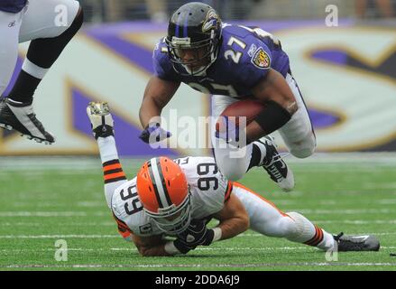 NO FILM, NO VIDEO, NO TV, NO DOCUMENTARY - Baltimore Ravens running back Ray Rice is tripped up by Cleveland Browns linebacker Scott Fujita during the first half at M&T Stadium in Baltimore, MD, USA on September 26, 2010. The Ravens won, 24-17. Photo by Doug Kapustin/MCT/Cameleon/ABACAPRESS.COM Stock Photo