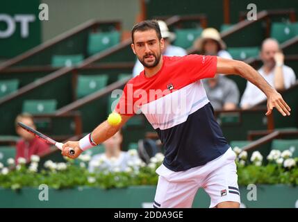 Marin Cilic of Croatia returns a shot during the men's singles first round match against James Duckworth of Australia at the French Open Tennis Tournament 2018 in Paris, France on May 29, 2018. The match was postponed due to a rainfall and Marin Cilic leads 6-3, 5-4. Photo by Christian Liewig/ABACAPRESS.COM Stock Photo