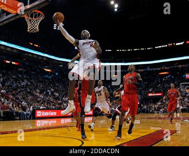 NO FILM, NO VIDEO, NO TV, NO DOCUMENTARY - The Miami Heat's LeBron James drives to the basket against the Toronto Raptors at the American Airlines Arena in Miami, Florida, on Saturday, November 13, 2010. Photo by Al Diaz/Miami Herald/MCT/Cameleon/ABACAPRESS.COM Stock Photo