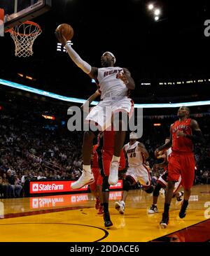 NO FILM, NO VIDEO, NO TV, NO DOCUMENTARY - The Miami Heat's LeBron James drives to the basket against the Toronto Raptors at the American Airlines Arena in Miami, Florida, on Saturday, November 13, 2010. Photo by Al Diaz/Miami Herald/MCT/Cameleon/ABACAPRESS.COM Stock Photo
