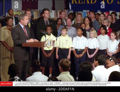 President George W. Bush talks with students at Emma E. Booker ...