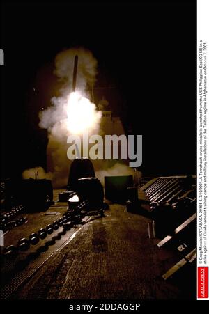 NO FILM, NO VIDEO, NO TV, NO DOCUMENTARY - © Greg Messier/KRT/ABACA. 29164-4. 7/10/2001. A Tomahawk cruise missile is launched from the USS Philippine Sea (CG 58) in a strike against al Qaeda terrorist training camps and military installations of the Taliban regime in Afghanistan on October 7, 200 Stock Photo