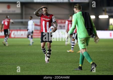 Exeter, UK. 24th Nov, 2020. Ryan Bowman of Exeter City with his hat-trick matchball and dejected goalkeeper Dean Gerken of Colchester United after the EFL Sky Bet League 2 match between Exeter City and Colchester United at St James' Park, Exeter, England on 24 November 2020. Photo by Dave Peters. Editorial use only, license required for commercial use. No use in betting, games or a single club/league/player publications. Credit: UK Sports Pics Ltd/Alamy Live News Stock Photo