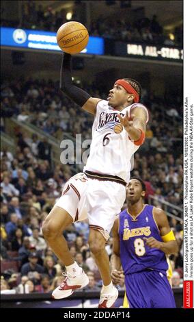 NO FILM, NO VIDEO, NO TV, NO DOCUMENTARY - © Jerry Lodriguss/KRT/ABACA. 36487-1. Philadelphia-PA-USA, 10/02/2002. Philadelphia's Allen Iverson goes up for a shot as LA Laker Kobe Bryant watches during the NBA All-Star game. Stock Photo