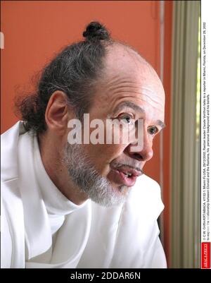 NO FILM, NO VIDEO, NO TV, NO DOCUMENTARY - © C.W. Griffin/KRT/ABACA. 41132-1. Miami-FL-USA. 29/12/2002. Raelian leader Claude Vorilhon talks to a reporter in Miami, Florida, on December 29, 2002 to explain the relationship between Clonaid and the Raelians, his personal background and his beliefs. Stock Photo