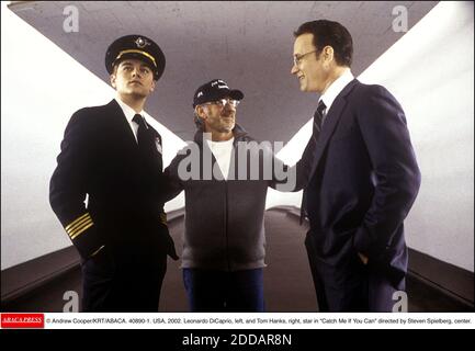 NO FILM, NO VIDEO, NO TV, NO DOCUMENTARY - © Andrew Cooper/KRT/ABACA. 40890-1. USA, 2002. Leonardo DiCaprio, left, and Tom Hanks, right, star in Catch Me If You Can directed by Steven Spielberg, center. Stock Photo