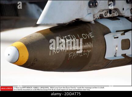 NO FILM, NO VIDEO, NO TV, NO DOCUMENTARY - © Nick Oza/KRT/ABACA. 42883-2. 28/02/2003. With Love from the Dunn Family reads the message written in chalk on a bomb mounted on a US Marine Corps F/A 18 at a Gulf region air base somewhere near Iraq. Stock Photo
