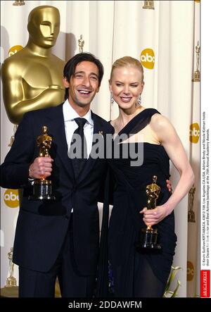 NO FILM, NO VIDEO, NO TV, NO DOCUMENTARY - © Kevin Sullivan/KRT/ABACA. 43812-108. Los Angeles-CA-USA. 23/03/03. Adrien Brody and Nicole Kidman holds their Oscars for Best Actor and Best Actress backstage at the 75th Annual Academy Awards. Stock Photo