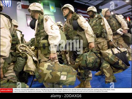 NO FILM, NO VIDEO, NO TV, NO DOCUMENTARY - © Richard Thomason/KRT/ABACA. 44211-4. Fort Benning-GA-USA, 01/04/2003. Soldiers from the 4th Infantry Division leave the manifest area at Fort Hood, Texas, to go to the airport for deployment overseas. The 4th Infantry Division began deployment to Kuwait Stock Photo