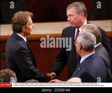 NO FILM, NO VIDEO, NO TV, NO DOCUMENTARY - © Saul Loeb/KRT/ABACA. 47751-3. Washington-DC-USA. British Prime Minister shakes hands with Attorney General John Ashcroft as Secretary of Defense Donald Rumsfeld and Secretary of State Colin Powell stand by before Blair addresses a joint session of the U Stock Photo
