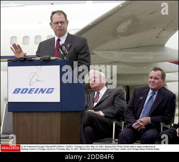 NO FILM, NO VIDEO, NO TV, NO DOCUMENTARY - © Jim Robinson/Chicago Tribune/KRT/ABACA. 53330-1. Chicago-IL-USA, May 10, 2001. Boeing CEO Philip Condit holds a news conference at Midway Airport in Chicago, Illinois on Thursday, May 10, 2001. Behind him are Illinois Governor Jim Ryan, center, and Chic Stock Photo