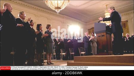 NO FILM, NO VIDEO, NO TV, NO DOCUMENTARY - © Chuck Kennedy/KRT/ABACA. 57404-5. Washington-DC-USA, March 19, 2004. President George W. Bush makes comments on the one-year anniversary of the start of military actions in Iraq, in the East Room of the White House. Stock Photo