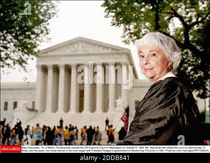 NO FILM, NO VIDEO, NO TV, NO DOCUMENTARY - Mary Naccarato, 74, of Miami, Florida poses outside the US Supreme Court in Washington on October 6, 1998. Ms. Naccarato has visited the court on opening day 13 times over the years. Her close interest in the court began with President Reagan's appointment of Sandra Day O'Connor in 1981. Photo by John Harrington/KRT/ABACA. Stock Photo