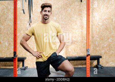 Handsome young man standing in gym Stock Photo