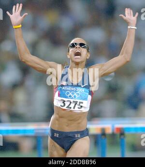 Joanna Hayes of the USA celebrates winning gold in the women's 100m ...