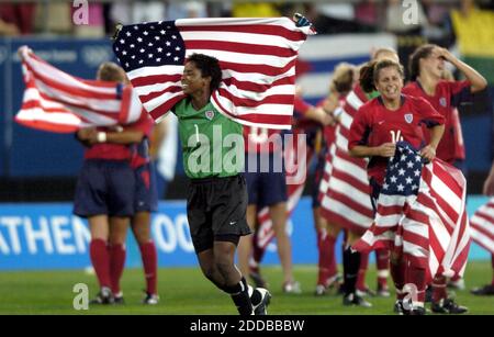 NO FILM, NO VIDEO, NO TV, NO DOCUMENTARY - US soccer team goalie Briana Scurry and teamates celebrate after their 2-1 win over Brazil Thursday, August 26, 2004 in the gold medal match at the Olympic Games in Athens. Photo by Mark Reis/Colorado Springs Gazette/KRT/ABACA. Stock Photo