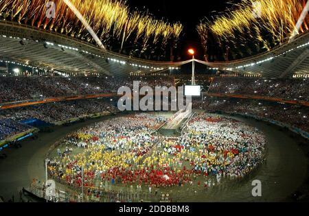 NO FILM, NO VIDEO, NO TV, NO DOCUMENTARY - Fireworks explode over Olympic Stadium during the closing ceremonies of the 2004 Olympic Games in Athens-Greece, on Sunday, August 29, 2004. Photo by Patrick Schneider/Charlotte Observer/KRT/ABACA. Stock Photo