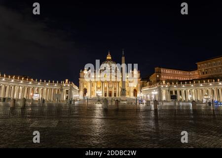 Illuminated St. Peter's Square with obelisk and St. Peter's Basilica against clear sky at night, Vatican City, Rome, Italy