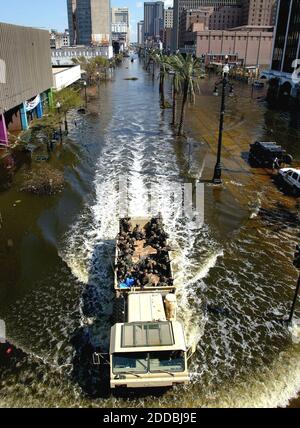 NO FILM, NO VIDEO, NO TV, NO DOCUMENTARY - Military personnel travel along flooded Canal Street in New Orleans, Louisiana, on Thursday, September 8, 2005. Hurricane Katrina left the city devastated and attempts are being made to remove remaining residents from the area. Photo by Khampha Bouaphanh/Fort Worth Star Telegram/KRT/ABACA Stock Photo