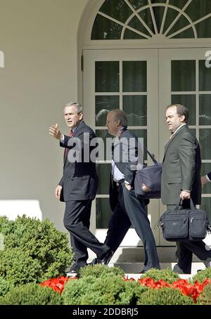 NO FILM, NO VIDEO, NO TV, NO DOCUMENTARY - President George W Bush, left, walks with top advisor Karl Rove, who will shed some duties, and outgoing Press Secretary Scott McClellan at the White House in Washington DC, USA, on April 19, 2006, after Bush's departure was delayed due to radio problems on his helicopter, Marine One. Photo by Chuck Kennedy/KRT/ABACAPRESS.COM Stock Photo